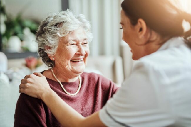 Senior with assisted living nurse Senior with assisted living nurse